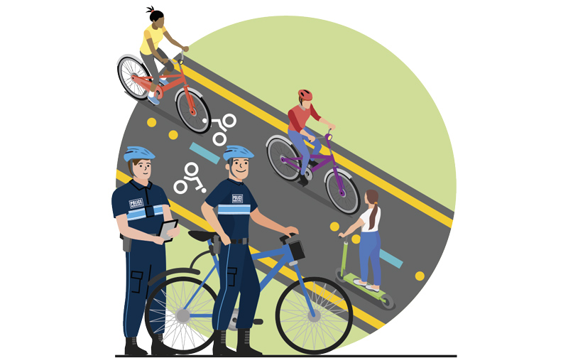Une illustration montre des policiers à vélo surveiller les pistes cyclables.